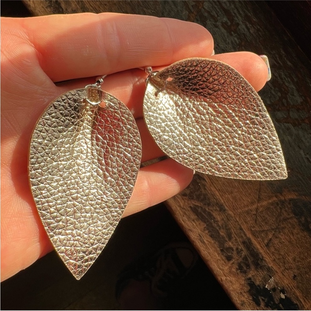 NWT Metallic Silver Petal Shaped Faux Leather Earrings